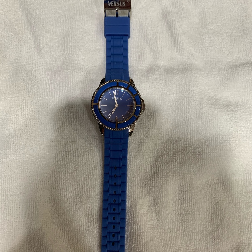 Versus watch with blue silicone strap.